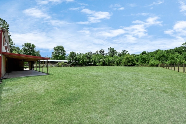 1576 Belle Terre Rd, Huffman, TX 77336 - view of green lawn with a patio