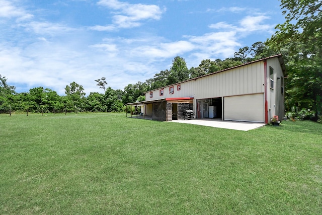 1576 Belle Terre Rd, Huffman, TX 77336 - view of grassy yard featuring an outbuilding and driveway