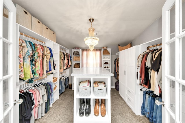 1576 Belle Terre Rd, Huffman, TX 77336 - spacious closet with light colored carpet and a chandelier