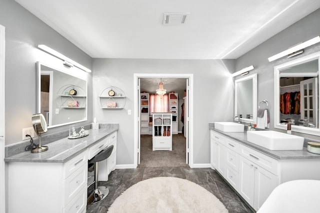 1576 Belle Terre Rd, Huffman, TX 77336 - bathroom with double vanity and baseboards