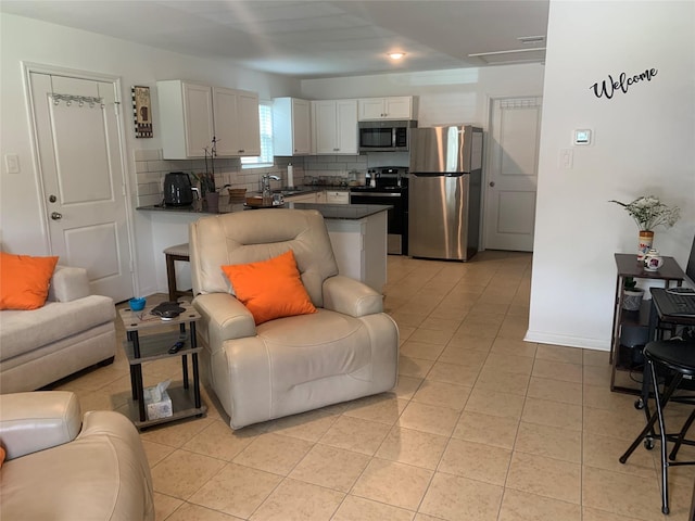16520 Jasmine Marie Pl, Conroe, TX 77306 - living area with light tile patterned floors