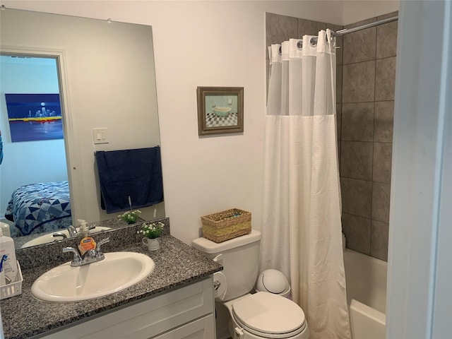 16520 Jasmine Marie Pl, Conroe, TX 77306 - bathroom featuring ensuite bathroom, vanity, toilet, and shower / tub combo with curtain