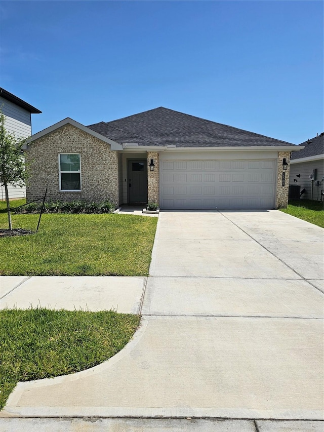 1307 Ricasoli Dr, Richmond, TX 77406 - single story home with an attached garage, concrete driveway, a front yard, and brick siding