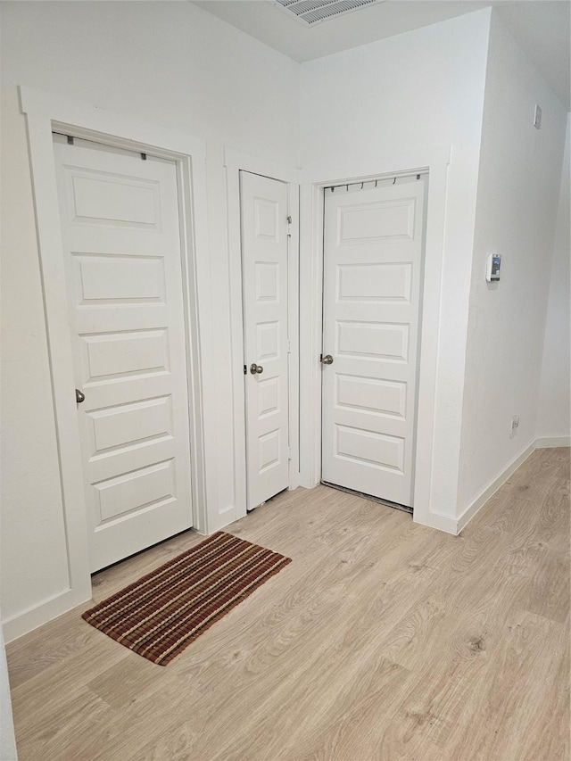 1307 Ricasoli Dr, Richmond, TX 77406 - entryway featuring light wood finished floors and baseboards