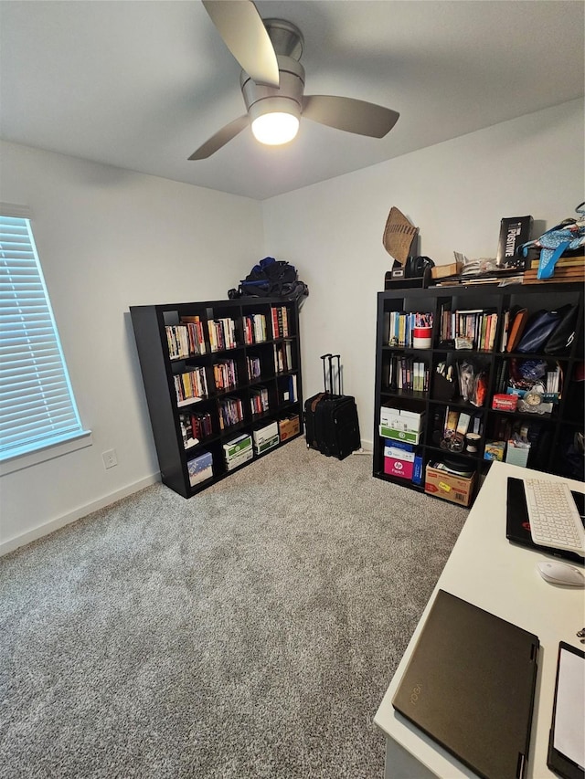 1307 Ricasoli Dr, Richmond, TX 77406 - carpeted home office featuring a ceiling fan and baseboards