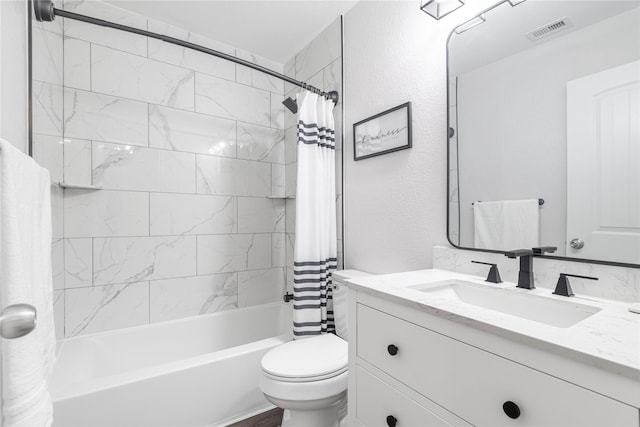8926 Rollick Dr, Tomball, TX 77375 - full bathroom with shower / bathtub combination with curtain, vanity, toilet, and a textured wall