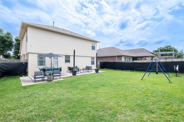 8926 Rollick Dr, Tomball, TX 77375 - back of house with a patio