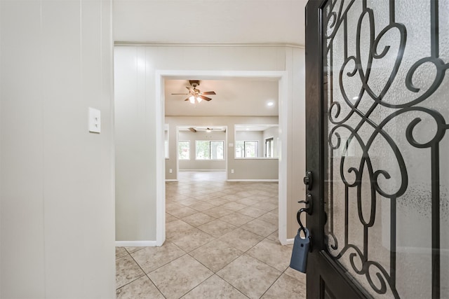 29090 W Lake Dr, Hempstead, TX 77445 - entryway with baseboards, light tile patterned flooring, and a ceiling fan