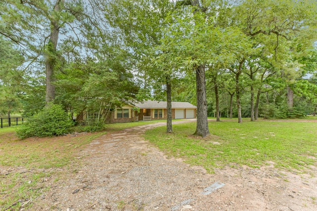 29090 W Lake Dr, Hempstead, TX 77445 - view of front of house featuring driveway and an attached garage