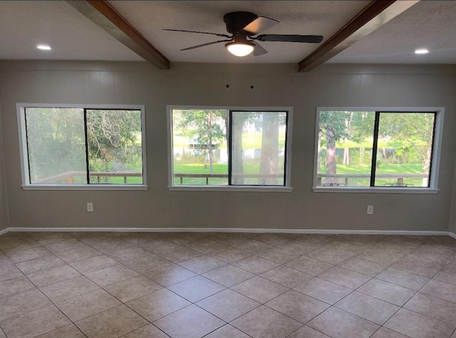 29090 W Lake Dr, Hempstead, TX 77445 - unfurnished room with beam ceiling, light tile patterned flooring, ceiling fan, healthy amount of natural light, and recessed lighting