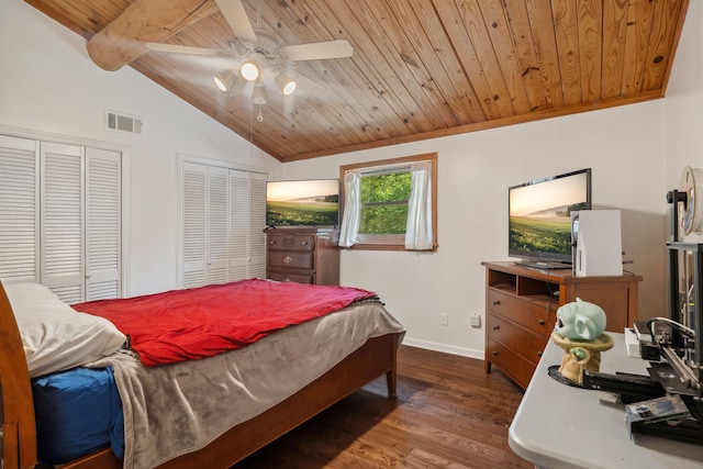 38614 Angel Oaks Dr, Magnolia, TX 77355 - bedroom with wood ceiling, two closets, wood finished floors, baseboards, and a ceiling fan