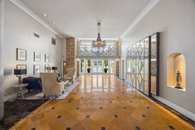 3030 Post Oak Blvd Unit 615, Houston, TX 77056 - community lobby with a high ceiling, ornamental molding, and recessed lighting