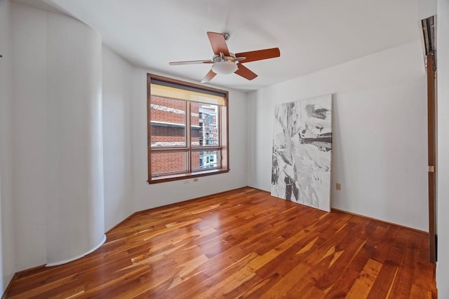 3030 Post Oak Blvd Unit 615, Houston, TX 77056 - spare room with wood finished floors and ceiling fan
