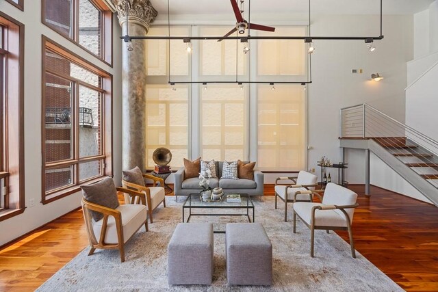 3030 Post Oak Blvd Unit 615, Houston, TX 77056 - living area with wood finished floors, a towering ceiling, and ceiling fan