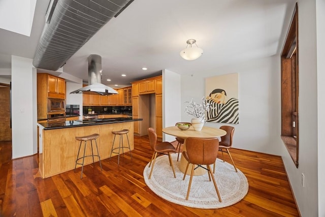 3030 Post Oak Blvd Unit 615, Houston, TX 77056 - dining room featuring dark wood-style floors and recessed lighting