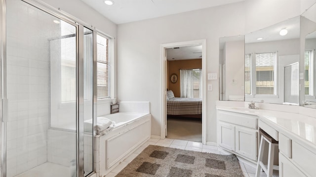 9618 Mystic Crossing Ct, Houston, TX 77065 - full bathroom with tile patterned flooring, a stall shower, ensuite bath, a bath, and vanity