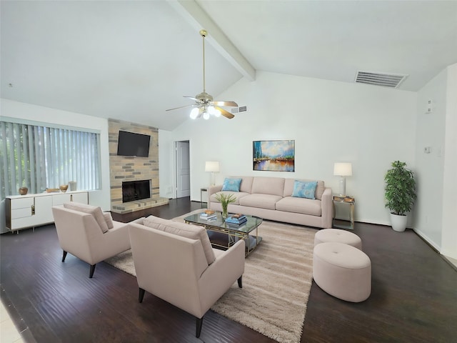 2922 Whetrock Ln, Sugar Land, TX 77479 - living room featuring wood finished floors, beamed ceiling, ceiling fan, a fireplace, and high vaulted ceiling