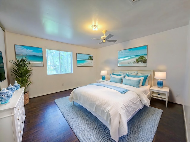 2922 Whetrock Ln, Sugar Land, TX 77479 - bedroom with baseboards, dark wood-style flooring, and ceiling fan