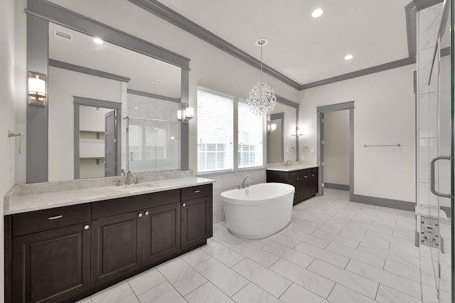 2331 Bottlebrush Ln, Conroe, TX 77384 - bathroom featuring a shower stall, crown molding, a soaking tub, a chandelier, and two vanities