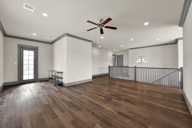 2331 Bottlebrush Ln, Conroe, TX 77384 - empty room with crown molding, ceiling fan, a chandelier, dark wood finished floors, and baseboards