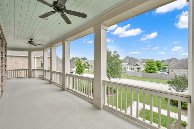 2331 Bottlebrush Ln, Conroe, TX 77384 - covered porch featuring ceiling fan and a residential view