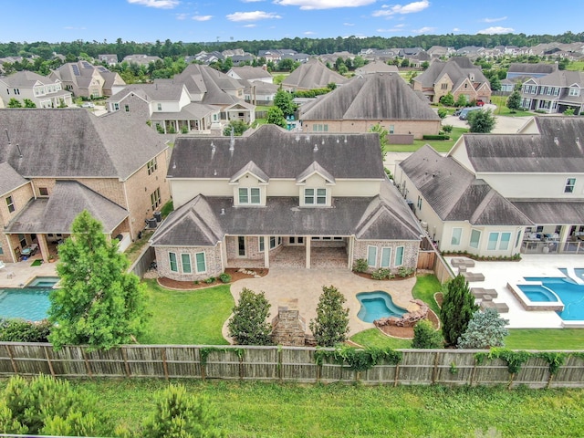 2331 Bottlebrush Ln, Conroe, TX 77384 - aerial perspective of suburban area featuring a pool area