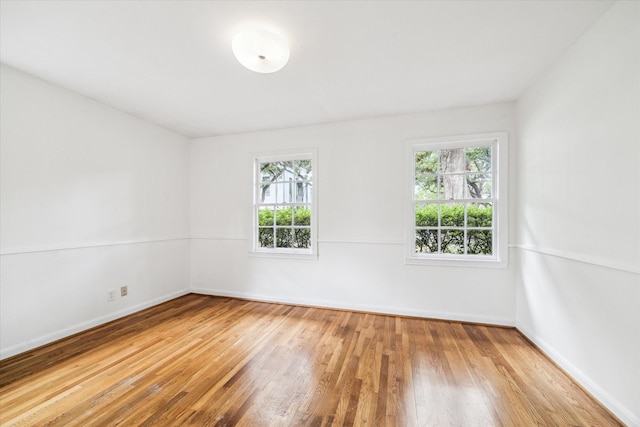 2740 Suffolk Dr, Houston, TX 77027 - spare room featuring hardwood / wood-style flooring and baseboards