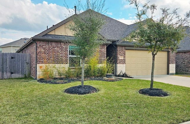 16342 Rockdale Landing Dr, Hockley, TX 77447 - view of front facade with brick siding, a garage, concrete driveway, and roof with shingles