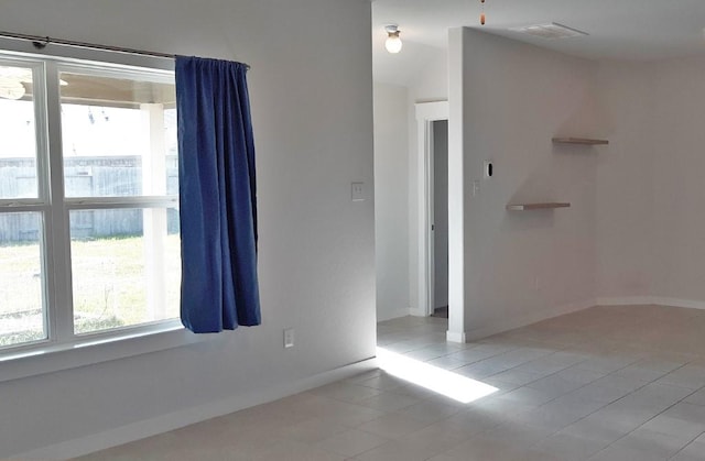 16342 Rockdale Landing Dr, Hockley, TX 77447 - tiled spare room featuring plenty of natural light and baseboards