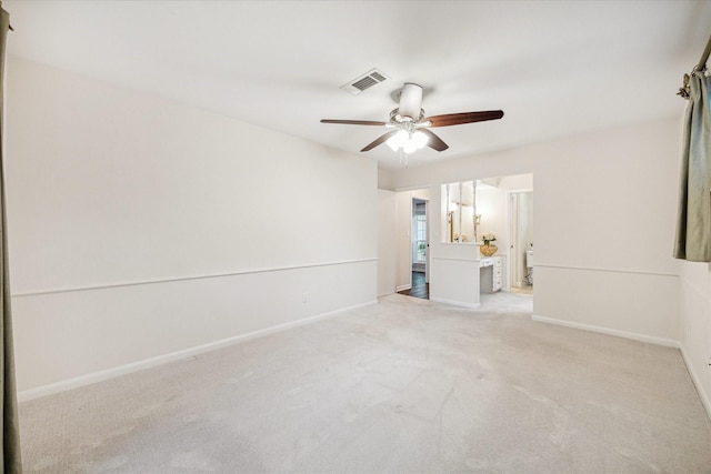 10014 Moorberry Ln, Houston, TX 77080 - spare room with a ceiling fan, light colored carpet, and baseboards