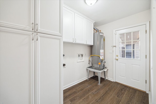 10014 Moorberry Ln, Houston, TX 77080 - laundry room with cabinet space, gas water heater, dark wood finished floors, hookup for a washing machine, and baseboards