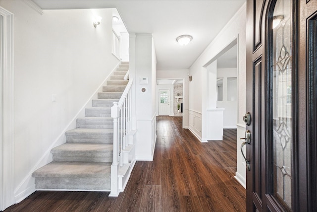 10014 Moorberry Ln, Houston, TX 77080 - entrance foyer featuring stairway, dark wood-style floors, and ornamental molding