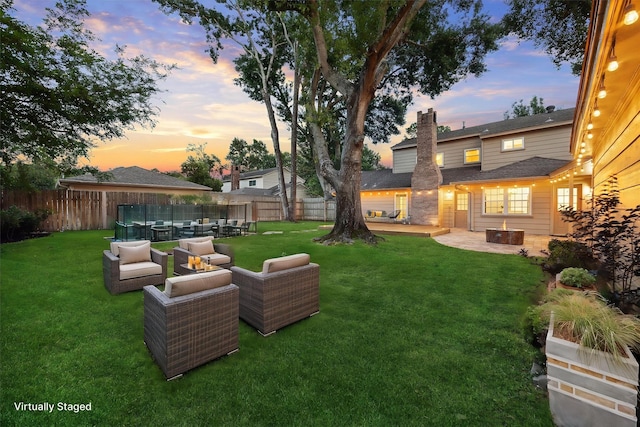 10014 Moorberry Ln, Houston, TX 77080 - view of yard with an outdoor living space with a fire pit and a patio