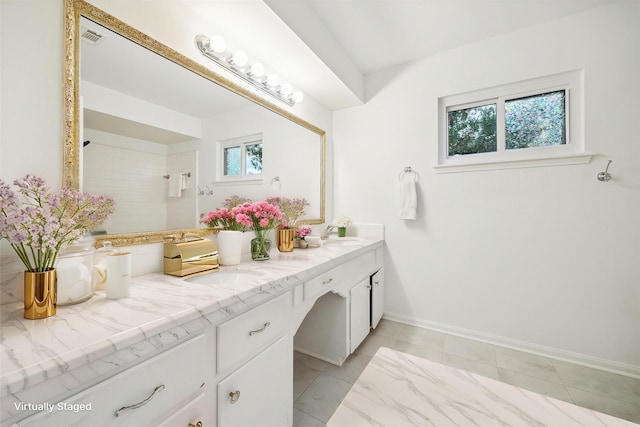 10014 Moorberry Ln, Houston, TX 77080 - full bath featuring double vanity, a tile shower, and baseboards