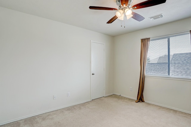 10911 Crosby Field Ln, Houston, TX 77034 - spare room with light carpet, ceiling fan, and baseboards
