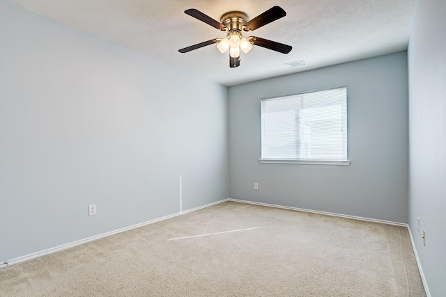 10911 Crosby Field Ln, Houston, TX 77034 - spare room with carpet, ceiling fan, and baseboards
