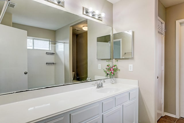 10911 Crosby Field Ln, Houston, TX 77034 - full bathroom with toilet, vanity, a shower, and baseboards