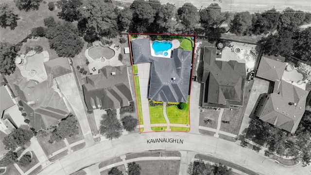 aerial view of property's location with a pool and property parcel outlined