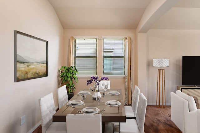 10750 Nathaniel Valley Path, Houston, TX 77016 - dining room with baseboards, vaulted ceiling, and wood finished floors