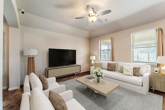 10750 Nathaniel Valley Path, Houston, TX 77016 - living area with a ceiling fan, arched walkways, and baseboards