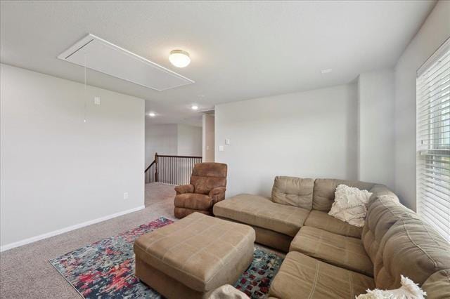 2498 Diamond D Dr, Beaumont, TX 77713 - carpeted living room featuring attic access, baseboards, and recessed lighting