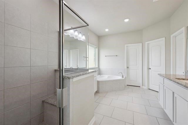 2498 Diamond D Dr, Beaumont, TX 77713 - full bathroom featuring a bath, tiled shower, vanity, tile patterned floors, and recessed lighting