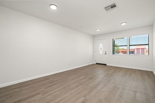 404 Glenmore Dr, Pasadena, TX 77503 - unfurnished room featuring wood finished floors, baseboards, and recessed lighting