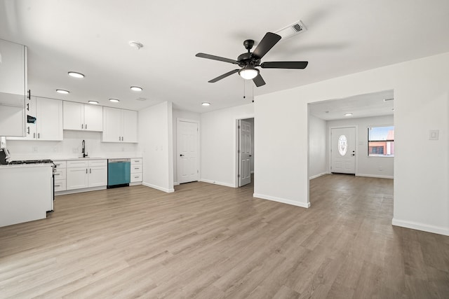 404 Glenmore Dr, Pasadena, TX 77503 - unfurnished living room with ceiling fan, baseboards, light wood finished floors, a sink, and recessed lighting