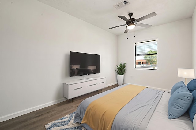 404 Glenmore Dr, Pasadena, TX 77503 - bedroom featuring wood finished floors, baseboards, and a ceiling fan