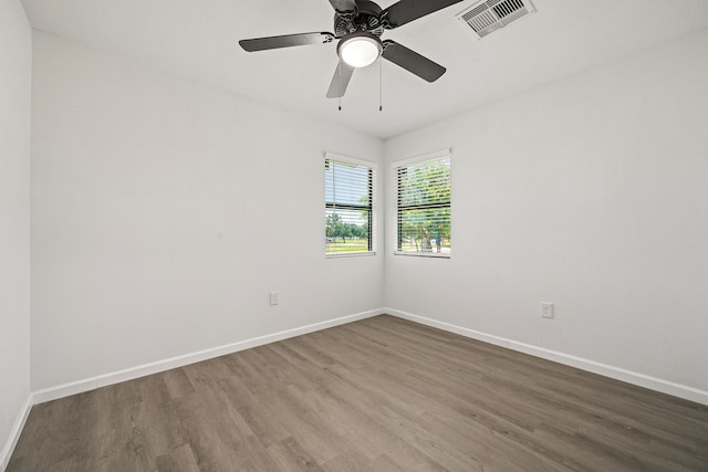 404 Glenmore Dr, Pasadena, TX 77503 - unfurnished room with wood finished floors, baseboards, and ceiling fan