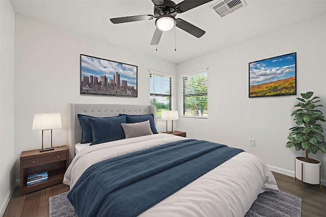 404 Glenmore Dr, Pasadena, TX 77503 - bedroom with baseboards, wood finished floors, and ceiling fan