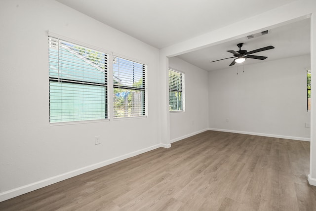 404 Glenmore Dr, Pasadena, TX 77503 - empty room with wood finished floors, baseboards, and ceiling fan