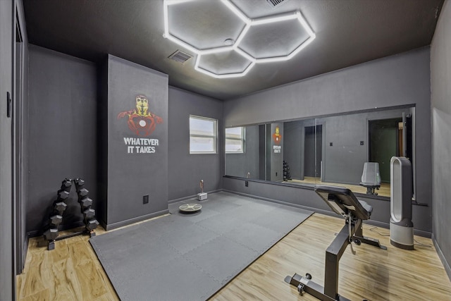24615 Mount Auburn Dr, Katy, TX 77494 - workout area featuring wood finished floors