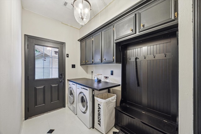 24615 Mount Auburn Dr, Katy, TX 77494 - washroom featuring cabinet space, hookup for a washing machine, and light tile patterned floors